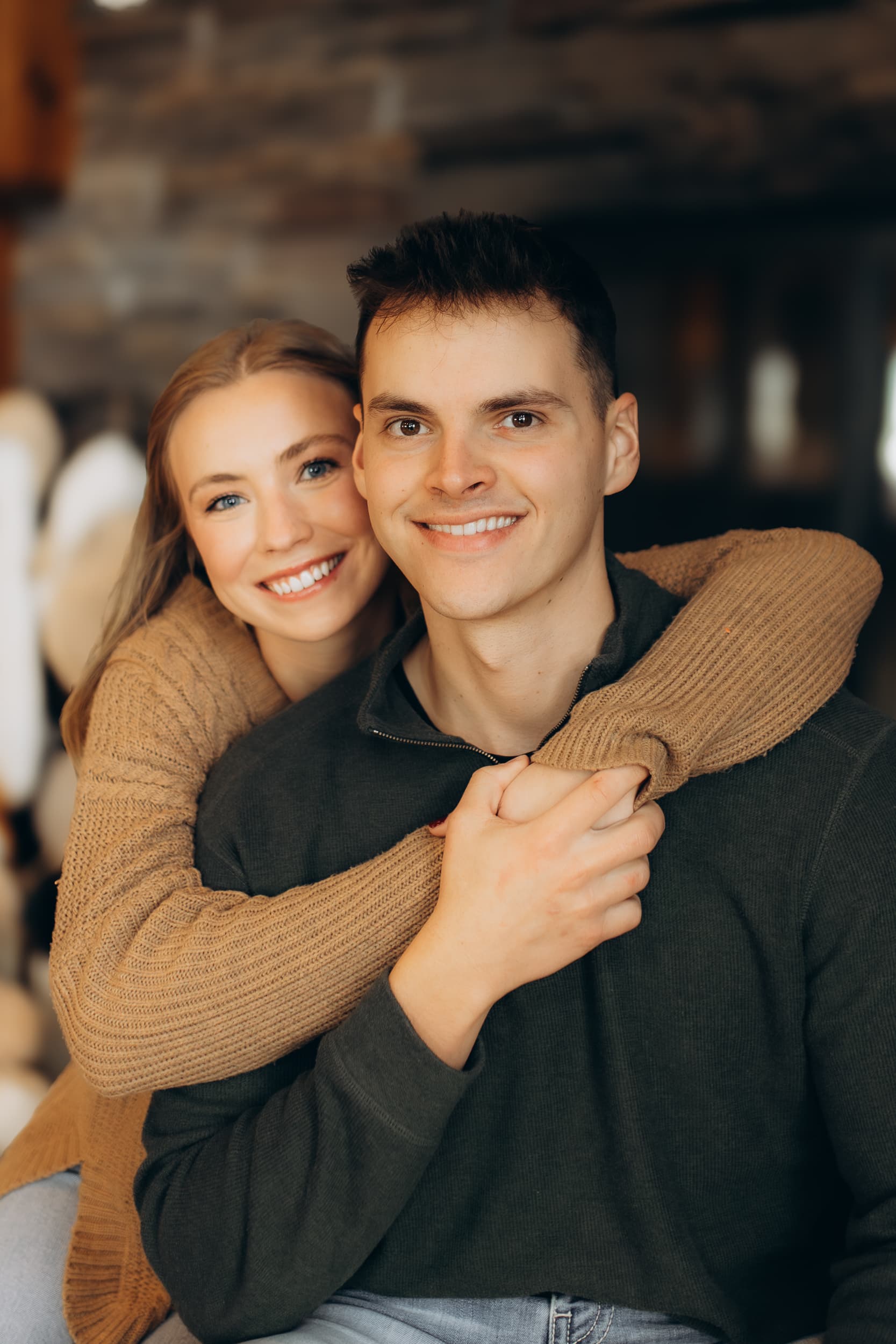 Abigail and Micah cozy indoors