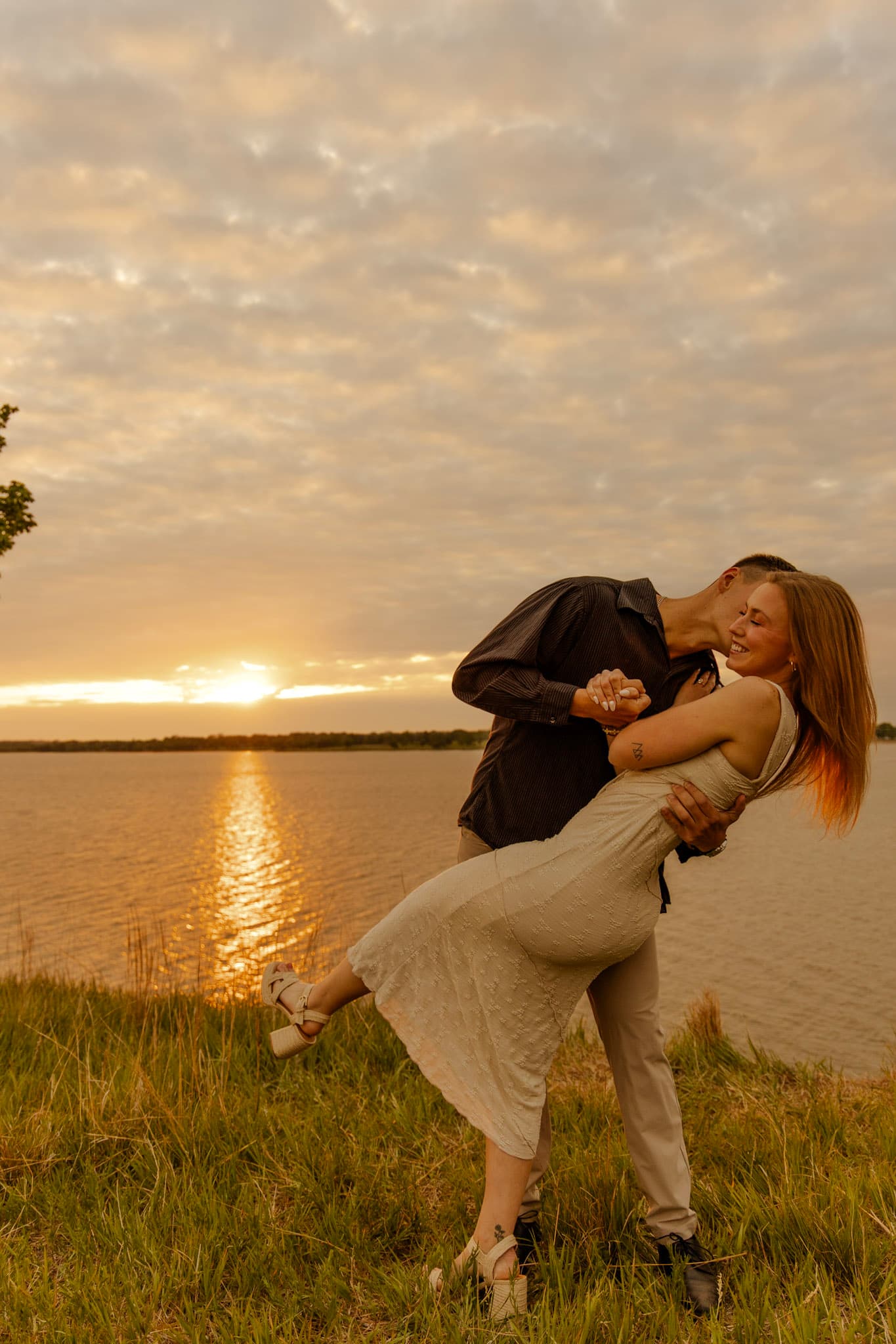 Abigail and Micah at golden hour by the lake